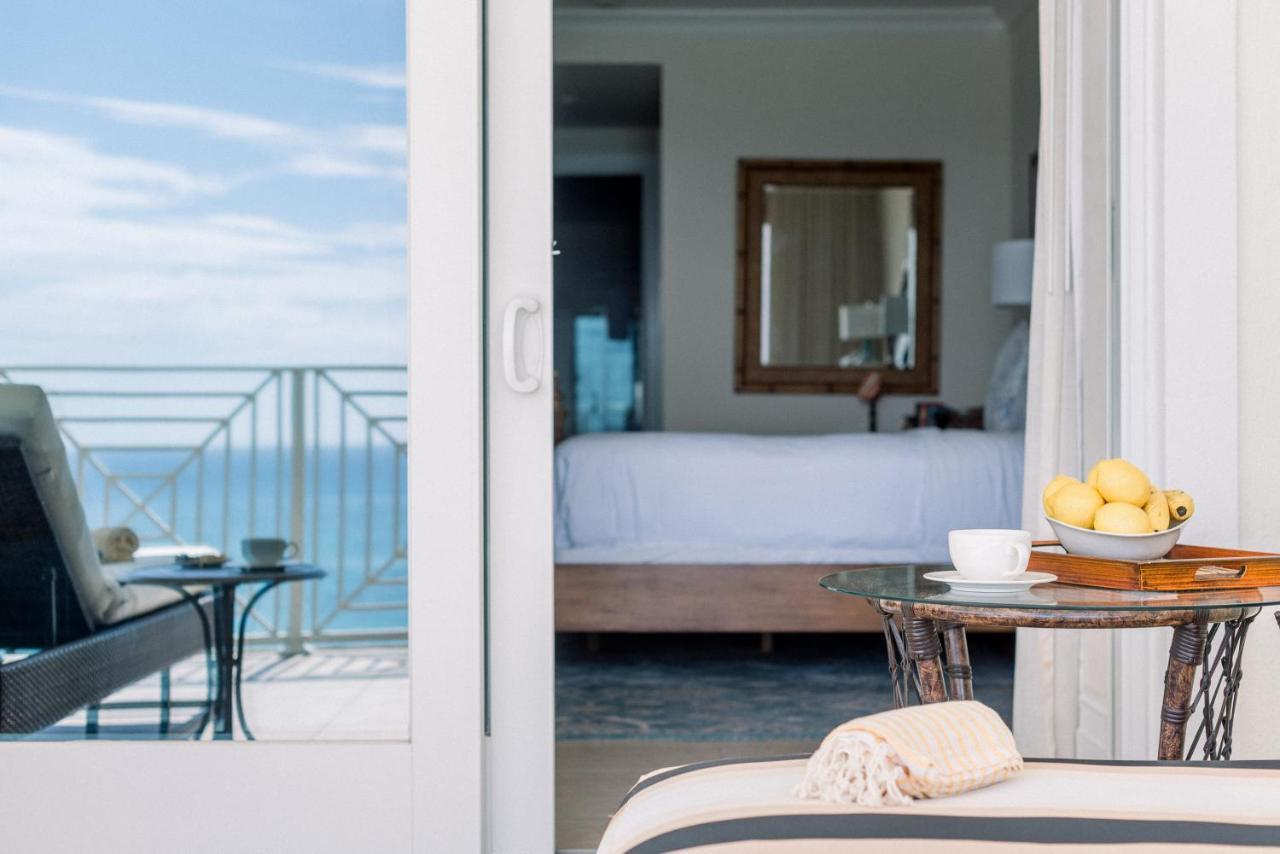 Caribbean Club Boutique Hotel, Grand Cayman Seven Mile Beach Экстерьер фото